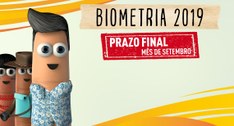 Imagem com fundo predominantemente amarelo de dedoches da revisão da biometria 2019 prazo final ...